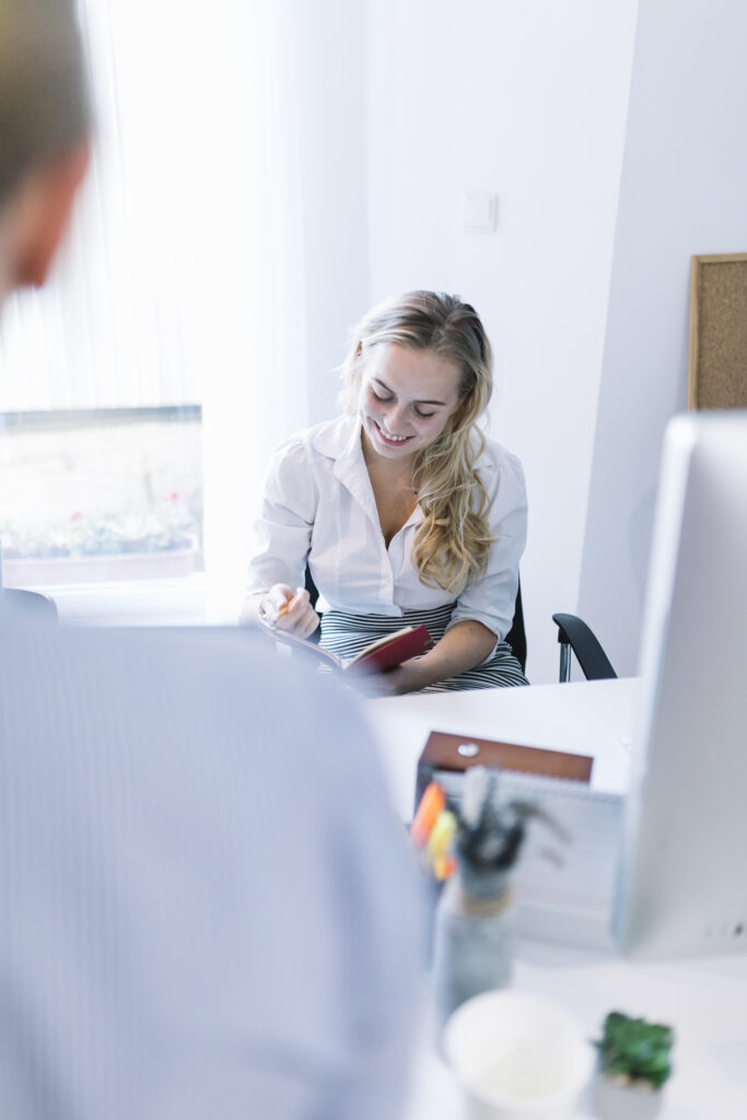 Smiling woman joining Encompass Wellness & Aesthetics